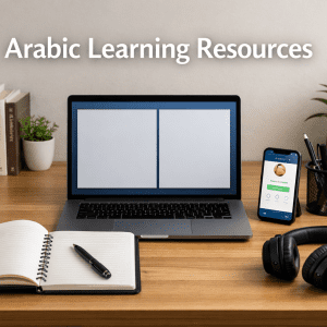 Organized home desk setup with laptop, smartphone app, notebook, books, and headphones for Arabic learning resources